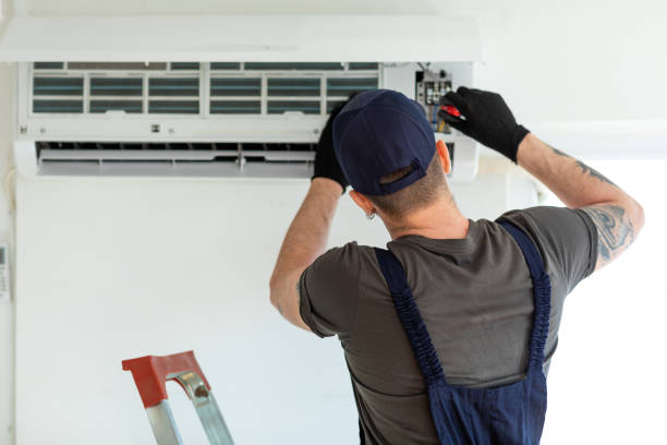 Technician Servicing Mini-Split System