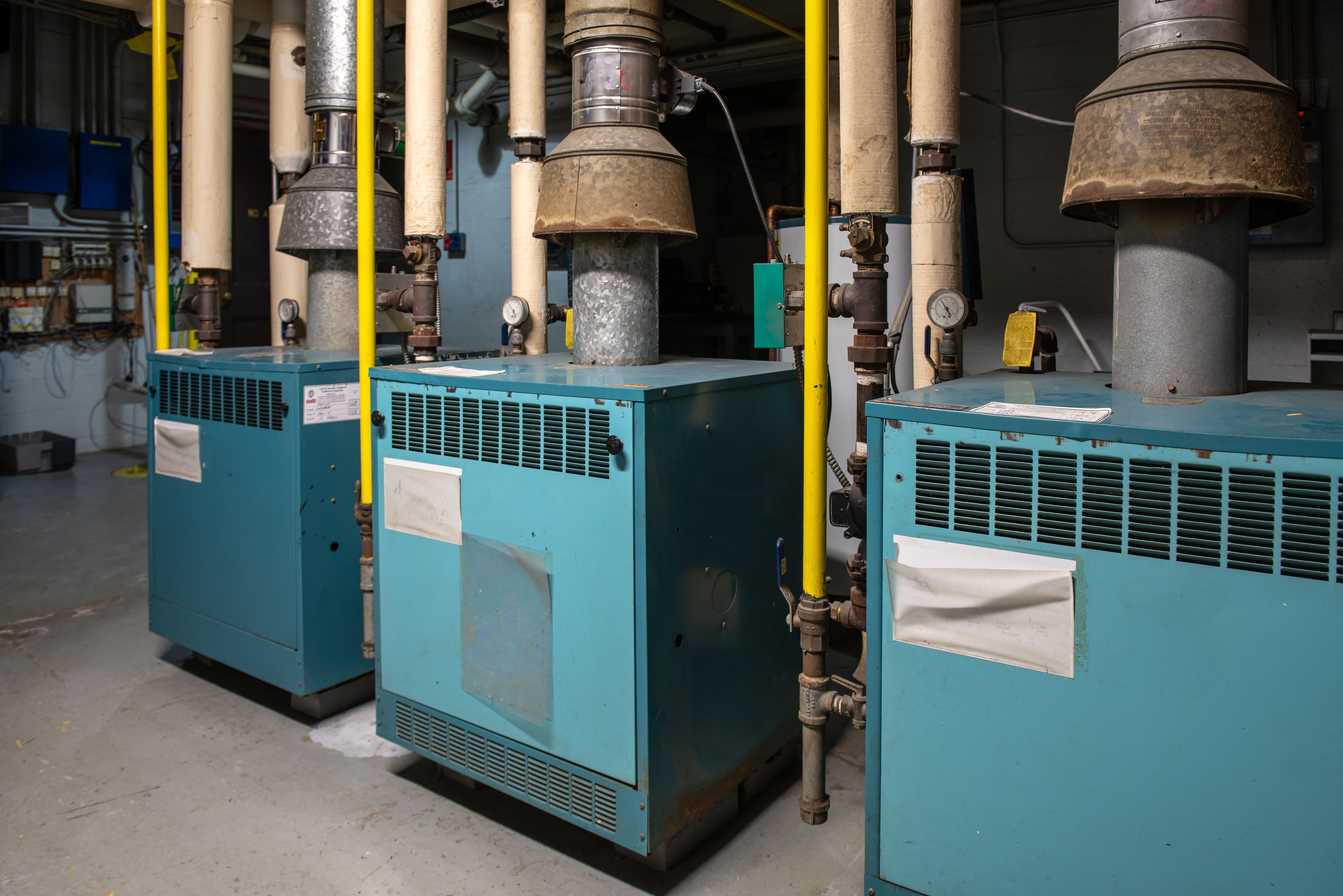 Multiple Boilers Side-By-Side in a Multi-Family Residence